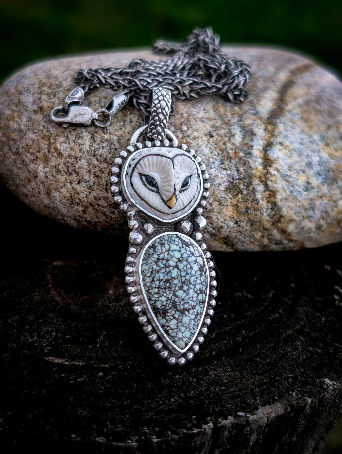 Hand-carved porcelain owl pendant with New Lander turquoise and 20-inch wheat chain on stone