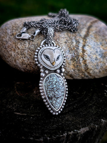 Hand-carved porcelain owl pendant with New Lander turquoise and 20-inch wheat chain on stone